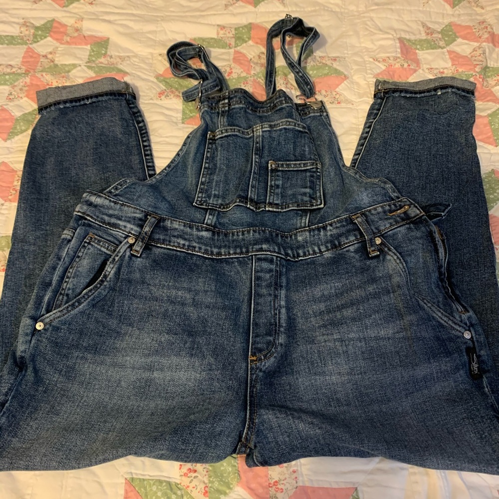 Women’s silver overalls washed but not worn